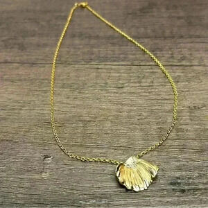 Gold Tone Sea Shell Decorated with Crystals Necklace